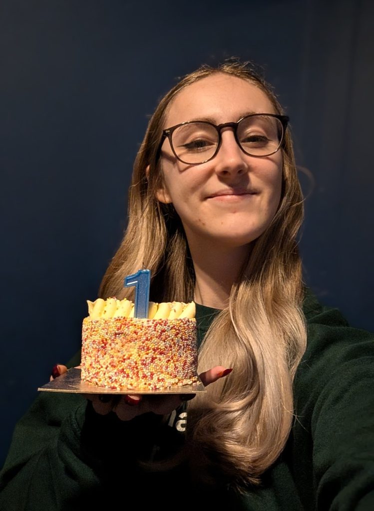 Rachel with the 1st birthday cake